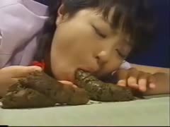 Asian whore sucks a hard poop on the table